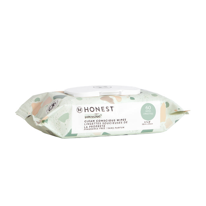 A 60-count resealable package of The Honest Company Clean Conscious™ Wipes, great for sensitive skin. These hypoallergenic wipes are fragrance-free and display a light green and beige abstract pattern for clean-conscious use.