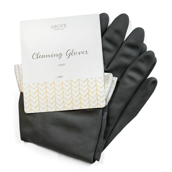 These dark gray Grove Co. Cleaning Gloves, ideal for dishwashing, feature textured fingertips and palms for a superior grip. Packaged with a white paper label featuring gold chevron patterns, they come as one durable latex pair.
