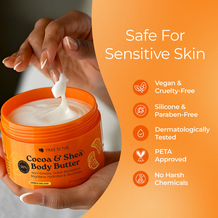 A person scoops white body butter for dry skin from an open orange jar labeled Moisturizing Coconut, Cocoa & Shea Butter Body Butter by Tree To Tub. The orange background highlights features like vegan, dermatologist tested, and safe for sensitive skin.