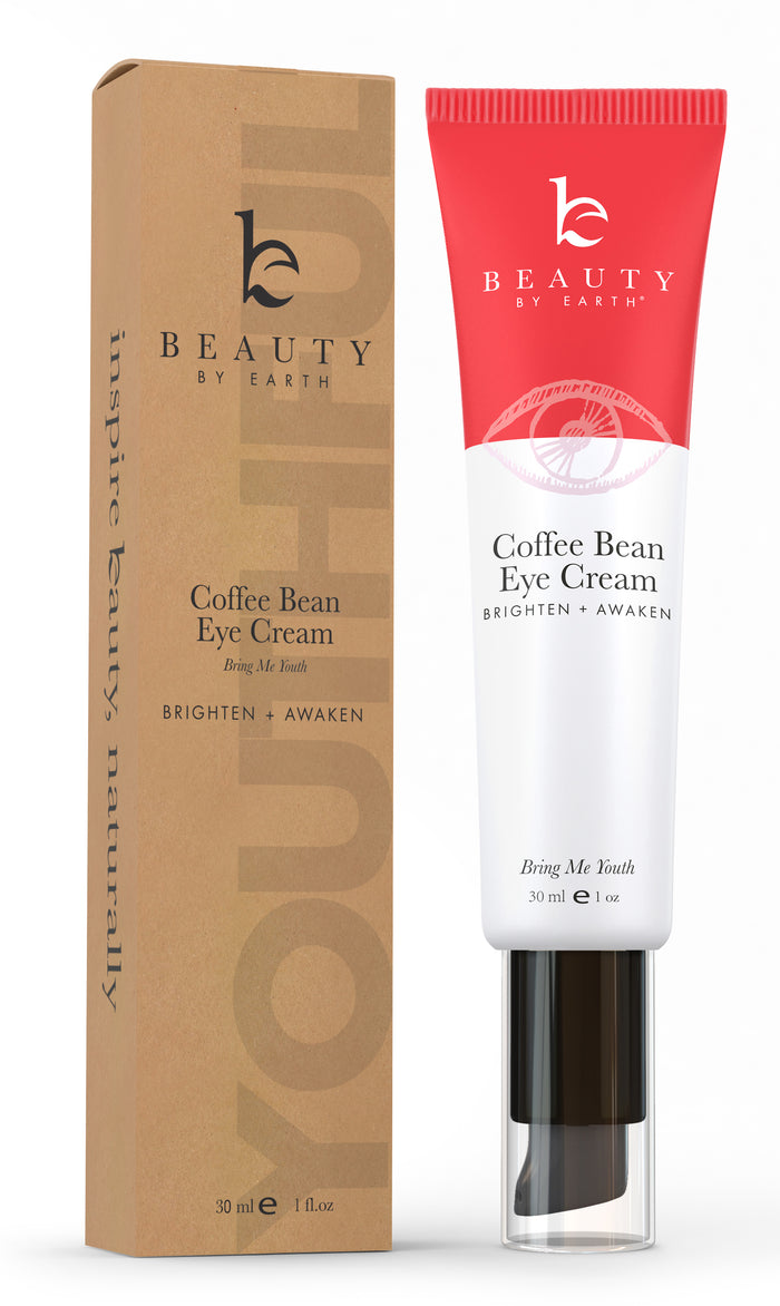A 30 ml tube of Beauty by Earths Coffee Bean Awakening Eye Cream, enriched with coffee seed extract to reduce dark circles and rejuvenate tired eyes. The red and white tube is packaged in a brown rectangular box featuring matching branding and product details.