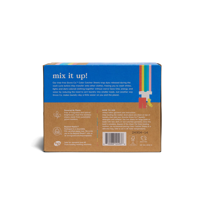 The image shows the back of a cardboard package of Grove Co. Color Catching Laundry Sheets, featuring a multicolored G logo, product description, and usage instructions. It promises an eco-friendly wash with tree-free packaging and boldly displays mix it up! at the top in vibrant text.