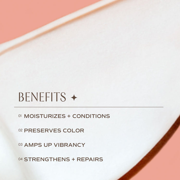 Close-up of a creamy texture with a text overlay listing benefits: moisturizes and conditions, preserves color, amps up vibrancy, strengthens, and repairs. The image has a soft, smooth appearance with a warm tone.