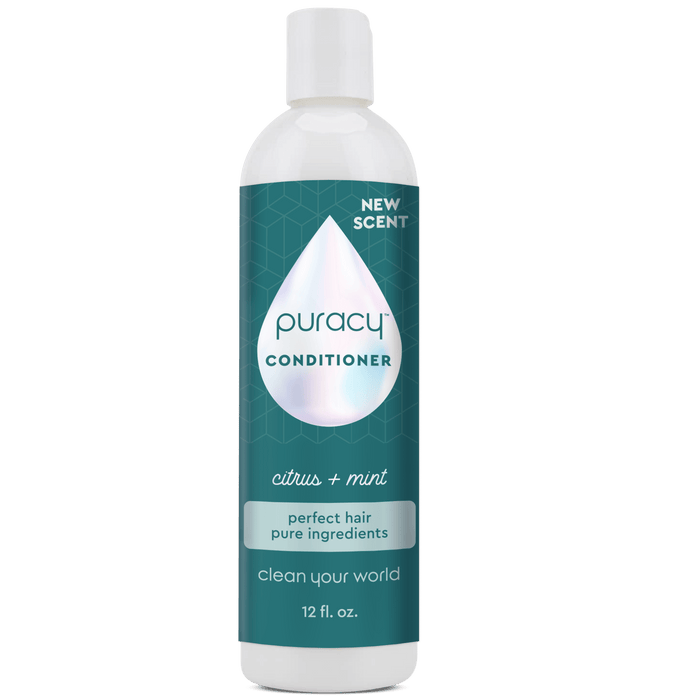 The Puracy Conditioner (Silicone/Dimethicone/Sulfate Free) comes in a bottle with a blue label, promoting its new Citrus + Mint scent. Enriched with natural essential oils, this sulfate-free formula deeply hydrates your hair, leaving it feeling refreshed and revitalized.