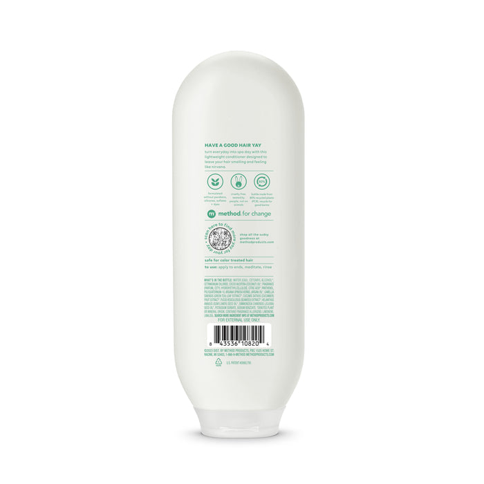 The back of the recycled white conditioner bottle from method features green text and a tree-shaped logo with method for change. This cruelty-free product includes claims, usage instructions, and a barcode at the bottom.