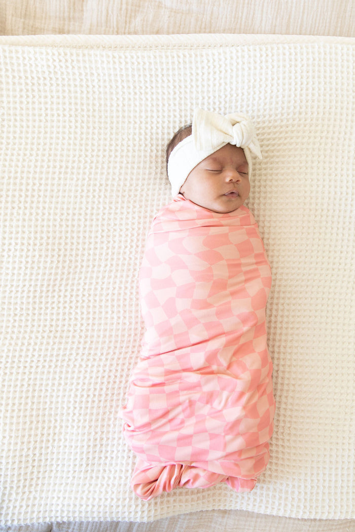 CORAL PINK WAVY CHECKER | SWADDLE