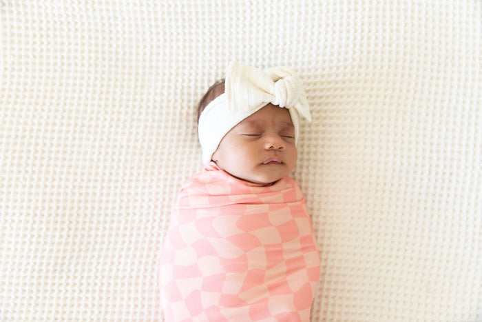 CORAL PINK WAVY CHECKER | SWADDLE