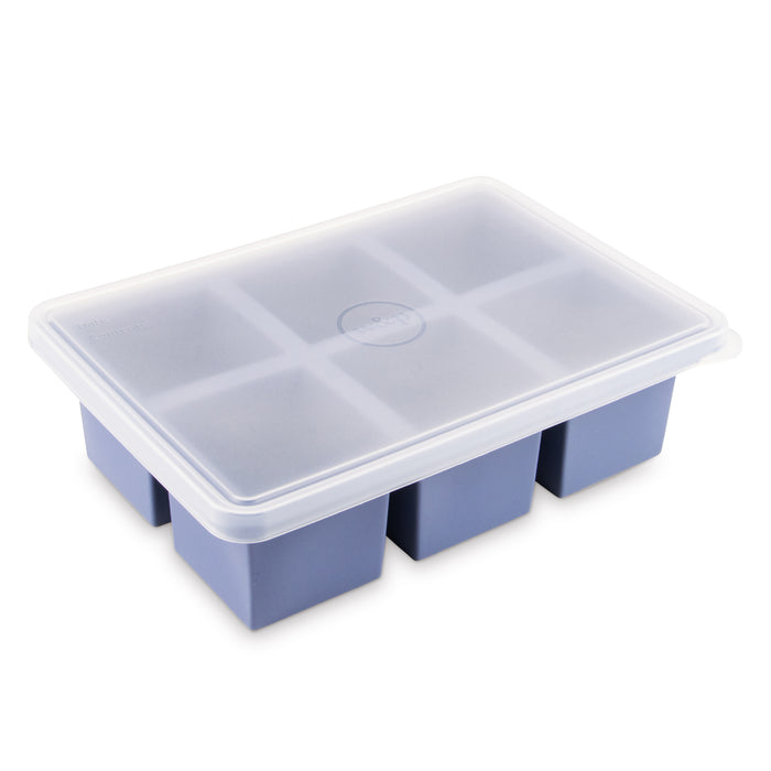 The W&P Cup Cubes Freezer Tray features a BPA-free lid and six large square compartments, made of blue silicone, perfect for freezer use, set against a plain white background.