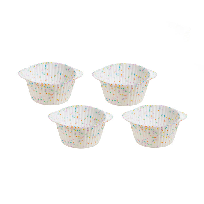 Four GIR Cupcake Liners with colorful polka dots are arranged in a grid on a plain white background, offering vibrant charm and an eco-friendly design.