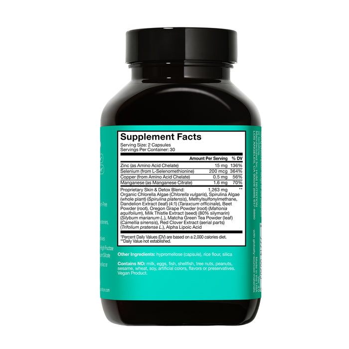 A black bottle with a teal label by HUM Nutrition shows supplement facts. It has 30 servings of 2 capsules, containing detoxifiers and nutrients like zinc, selenium, copper, manganese, prickly pear, chlorella + spirulina. This Daily Cleanse Detox Supplement - For Clear Skin supports your wellness journey.