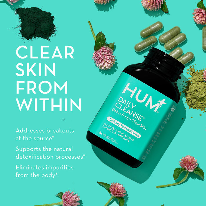 HUM Daily Cleanse supplements is open, with green capsules spilling out, surrounded by green powder, flowers, and leaves on a bright teal background. The text reads, "Clear skin from within. Addresses breakouts at the source, supports natural detox.