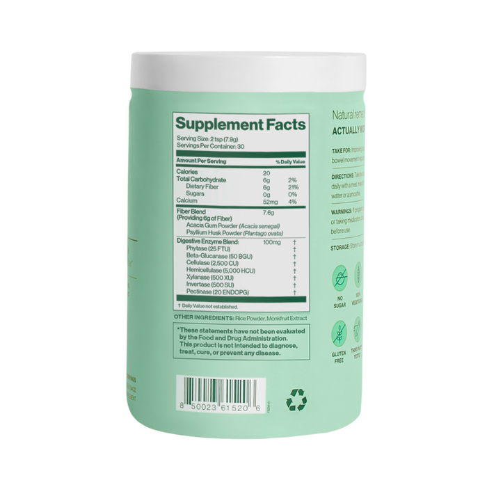 The Hilma Daily Fiber + Digestive Enzymes comes in a cylindrical container with a light green label displaying bold Supplement Facts, detailing prebiotic fiber for sensitive stomachs and serving size. A recycling symbol is at the bottom, maintaining a clean, minimalistic design.
