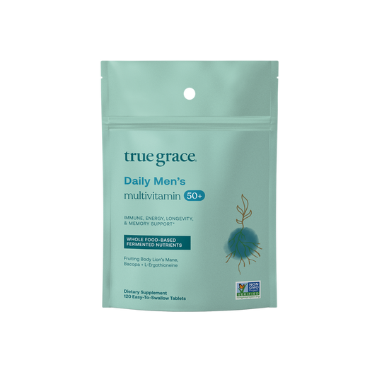 A teal pouch labeled True Grace Daily Mens 50+ Multivitamin - Refill Pouch offers immune, energy, longevity, and memory support with whole food-based fermented nutrients. It holds 120 tablets and proudly displays the Non-GMO Project Verified logo at the bottom.