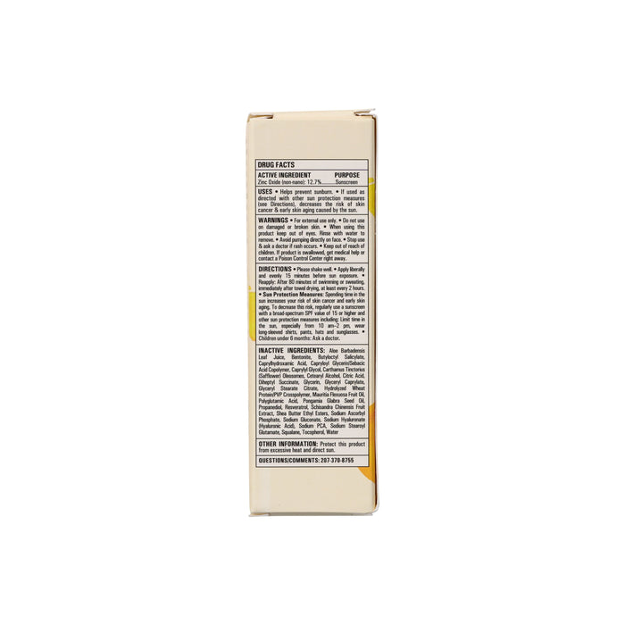 Side view of a Mad Hippie Daily Protective Serum box displays drug facts, uses, warnings, directions, inactive ingredients like buriti oil in black on white. Small text includes info and contact number, highlighting its hydrating SPF 30+ formula.