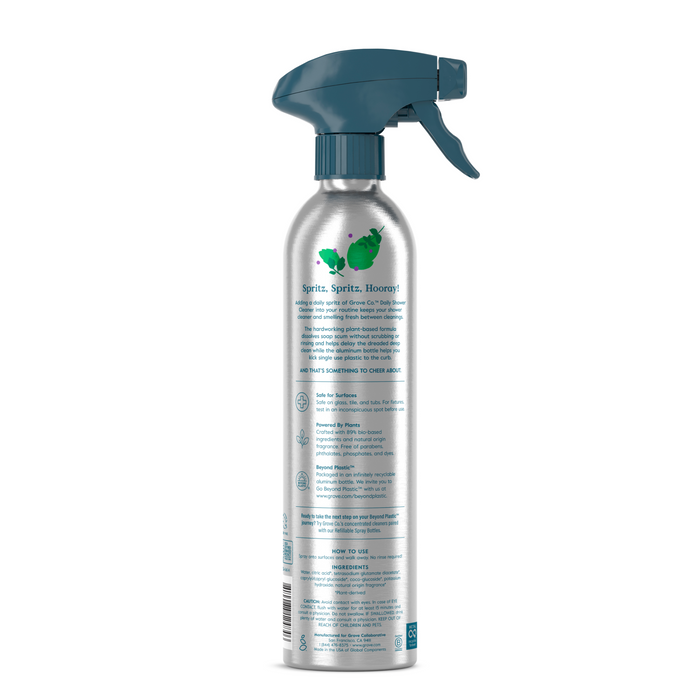 Grove Co.s Daily Shower Cleaner, coming soon, features a silver recyclable aluminum spray bottle with a teal nozzle and green leaf graphics. It offers a Wild Mint scent and a plant-based formula, highlighted by leaf and recycling symbols on the label.