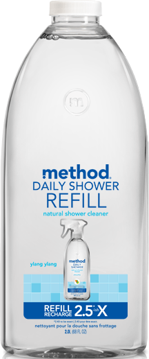 Method Daily Shower Refill, a clear plastic bottle, uses powergreen™ technology for effective cleaning. This natural ylang-ylang scented cleaner is vegan-friendly, featuring a spray bottle image on the label and offering a 2.5x larger refill size.