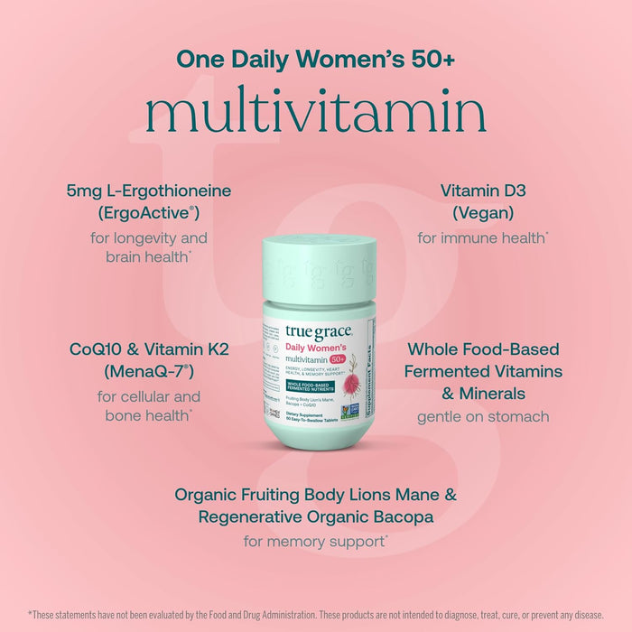 A mint-green bottle of True Grace Daily Women’s 50+ Multivitamin Tablets - Longevity & Memory Support* rests on a pink background, with text highlighting key ingredients and benefits for women over 50.