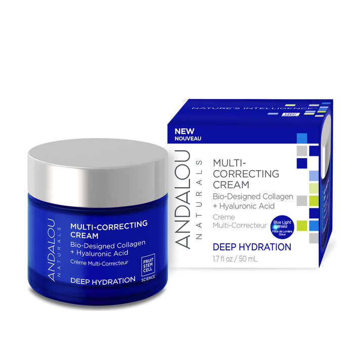 The Andalou Naturals Deep Hydration Multi-Correcting Cream, displayed in a blue jar and white box, features bio-designed vegan collagen, hyaluronic acid, and Fruit Stem Cell Science. It offers deep hydration and blue light defense against a pristine white backdrop.