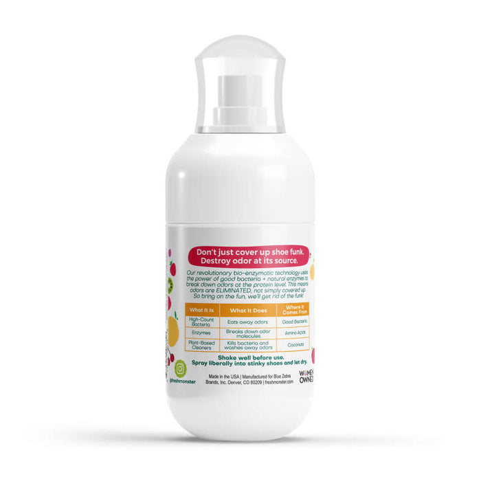 A white spray bottle with a clear cap features vibrant graphics and text, promoting Fresh Monsters Deodorizing Shoe Spray. It highlights the bio-enzymatic technology for eliminating shoe odor at the source and advertises its natural scent, urging you to Destroy odor at its source.