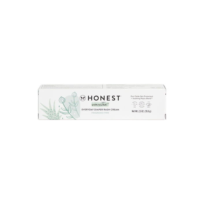 The Honest Companys Diaper Rash Cream for sensitive skin comes in a white box with green plant illustrations, featuring the soothing Phyto-Blend™ formula. Its hypoallergenic, fragrance-free, and weighs 2.5 oz/70.8 g.