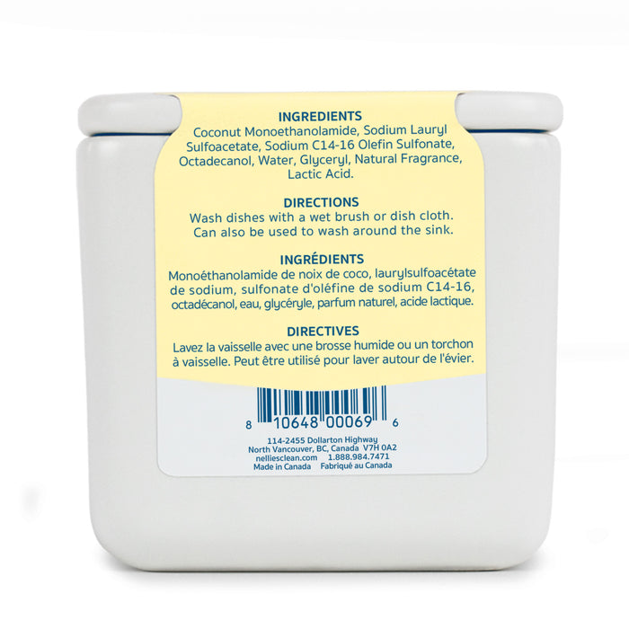 A white container with a yellow label in English and French lists ingredients, directions, manufacturer info, and a barcode. Nellie's Dish Butter is a zero-waste dish soap for effective green cleaning.