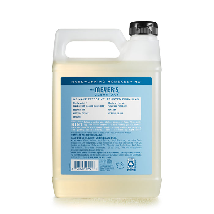 A jug of Mrs. Meyers Dish Soap Refill features a cruelty-free formula with plant-derived ingredients, essential oils, aloe vera extract, and glycerin, free from phthalates or artificial colors.