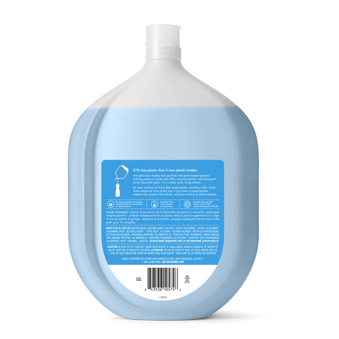 Image of an oval-shaped, light blue-and-white method Dish Soap Refill bottle made from recycled plastic. The partially transparent bottle has a blue label with white text on the back, emphasizing its ultra grease-fighting formula with Clementine Sea Minerals.