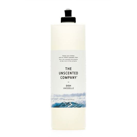 A 750 ml tall, clear bottle of The Unscented Company Dish Soap with a black flip-top cap and minimalist label featuring waves, containing vegan and fragrance-free dish soap.