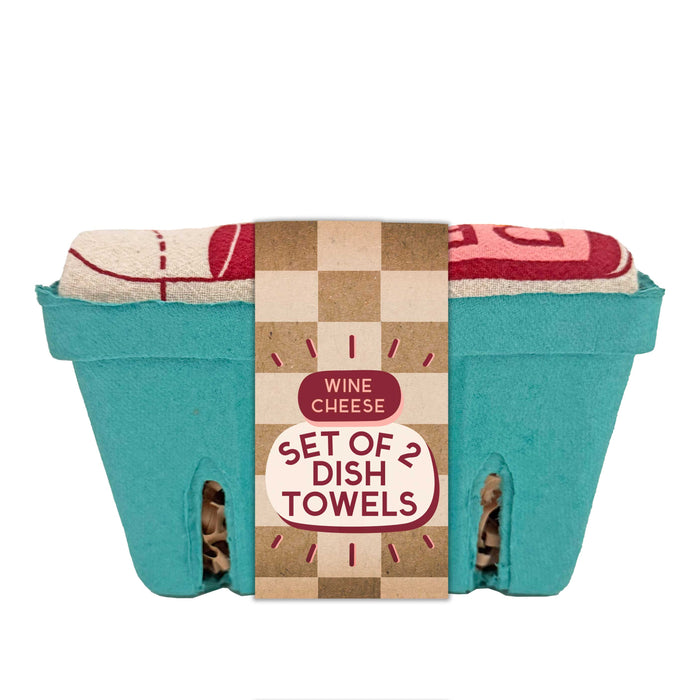 A turquoise basket holds two folded cotton dish towels in red and beige. A front label reads “Dish Towel Set” from The Neighborgoods, making it a charming addition to any dish towel collection.