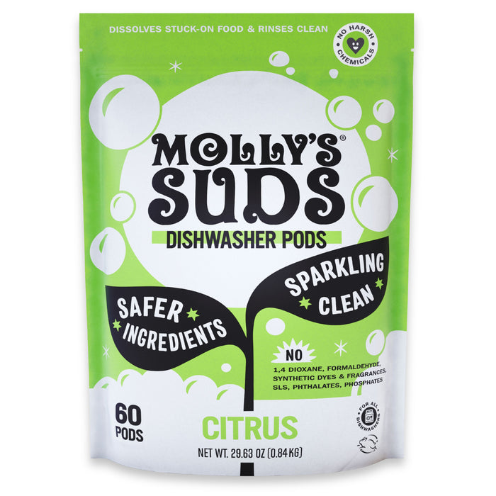 A green and white pouch of Molly’s Suds Dishwasher Detergent Pods, citrus scented with 60 pods, labeled “Safer Ingredients” and “Sparkling Clean”—made without harsh chemicals, synthetic dyes, or fragrances.