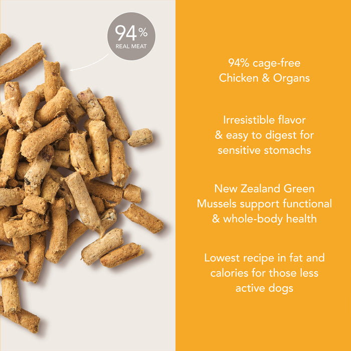 Pile of stick-shaped K9 Natural Grain-Free Freeze-Dried dog food on a light surface. Made with 94% real, cage-free chicken and organs, added green mussels, low fat/calorie for less active dogs, natural support for sensitive stomachs.