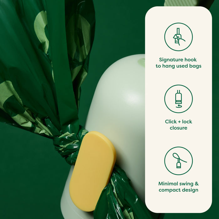 A green background with a device holding a green bag, featuring a yellow click-lock closure. To the right, three icons describe features: a hook to hang bags, click and lock closure, and minimal swing, compact design.