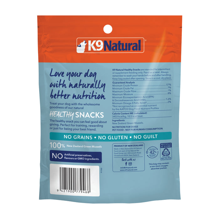 The K9 Natural Grain-Free Freeze-Dried Dog Treats in red and blue packaging boast Love your dog with naturally better nutrition, featuring New Zealand green mussels. These treats are grain, gluten, and guilt-free, with no artificial additives.