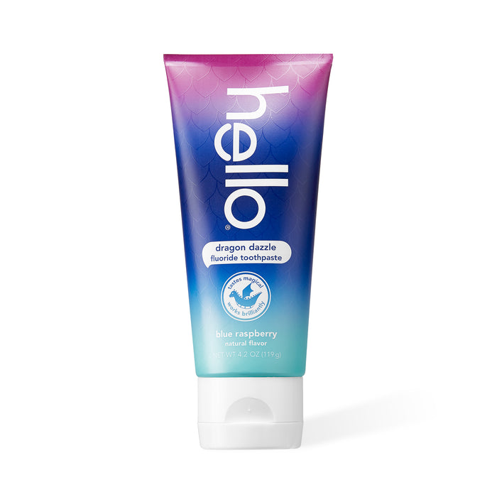 Hellos Dragon Dazzle Toothpaste features a vibrant dragon-themed tube with purple-to-teal hues and a fish-scale pattern. The bold label highlights its blue raspberry flavor, naturally enhanced by xylitol, for an enchanting brushing experience.