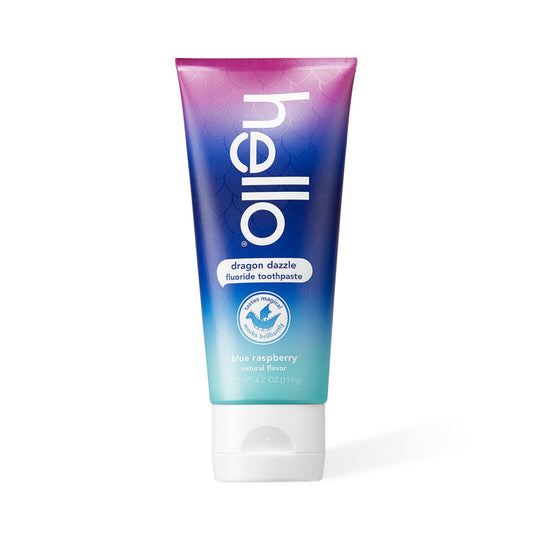 Hellos Dragon Dazzle Toothpaste features a vibrant dragon-themed tube with purple-to-teal hues and a fish-scale pattern. The bold label highlights its blue raspberry flavor, naturally enhanced by xylitol, for an enchanting brushing experience.