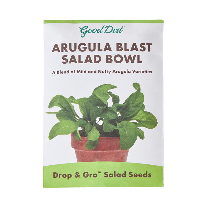 The Seed Pack - Arugula Blast Salad Bowl by Good Dirt shows arugula flourishing in a pot, with text stating: A Blend of Mild and Nutty Arugula Varieties and Drop & Gro™ Seed Pod for Effortless Growing.