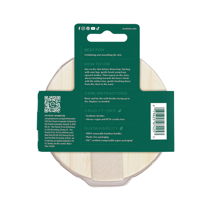 The image shows the back of an EcoTools Dry Body Brush package with green labeling, emphasizing sustainable materials. It includes usage instructions, care tips, exfoliating benefits, and a QR code. The packaging states its vegan and cruelty-free.