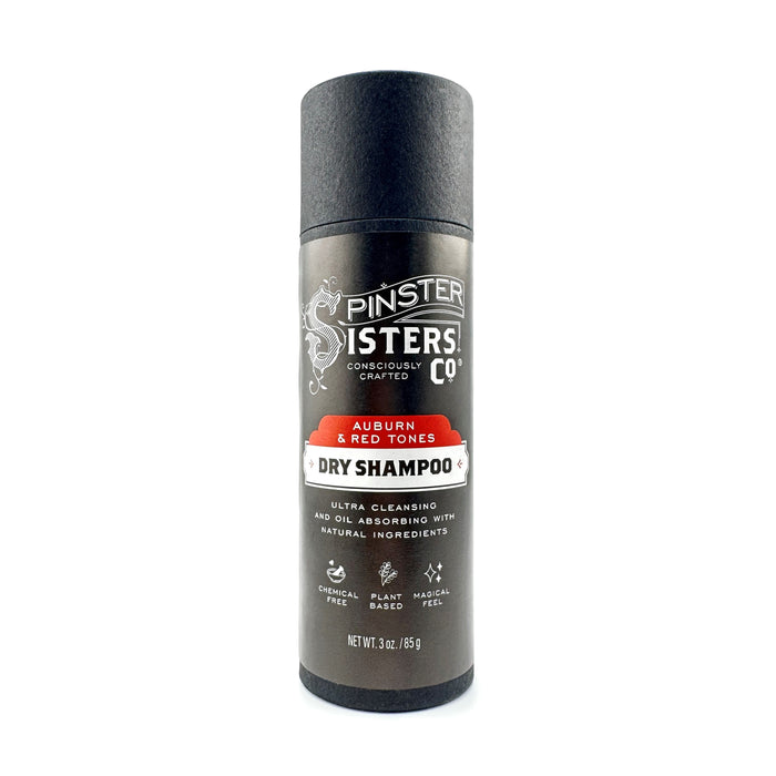 The black cylindrical Spinster Sisters Co. Dry Shampoo for auburn and red tones features ultra-cleansing, oil-absorbing natural ingredients like volumizing rice starch and deodorizing baking soda. Its cruelty-free, plant-based, and weighs 3 oz (85g).