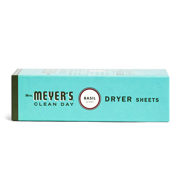 A rectangular teal box of Mrs. Meyers Dryer Sheets featuring a fresh basil scent highlights its status as a premier fabric softener, boldly displaying the product name on the front.