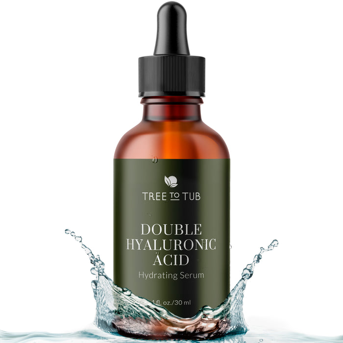 A brown bottle of Tree To Tub Dual Action Deep Hydrating Hyaluronic Acid Serum for Face with a black dropper, surrounded by splashing water, highlights its hydrating power. This anti-aging serum is your secret weapon for youthful radiance.
