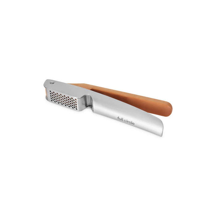 The Easy-Clean Garlic Press by Full Circle boasts a stainless steel body and ergonomic brown scraper handle. With a sleek, modern design featuring a grated section for crushing garlic, its dishwasher safe and showcases the Full Circle brand name on the side.