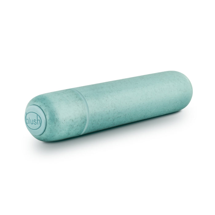 A teal, smooth, cylindrical Eco Bullet with blush on one end is placed horizontally on a white background. Its a sustainable sex toy by Blush Gaia, known for its waterproof design.