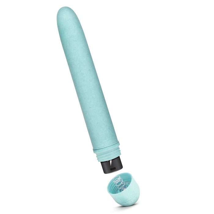 The Blush Gaia Eco is a light blue elongated cylindrical sex toy with a removable cap revealing a black compartment and spring mechanism, crafted to be body safe and eco-friendly.
