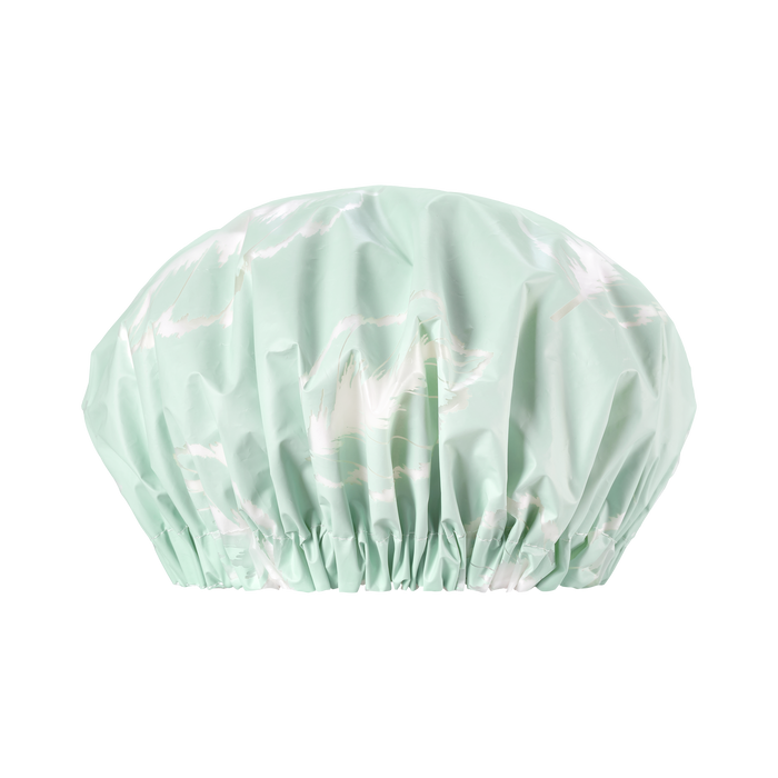 Introducing the Eco XL Shower Cap by EcoTools, a sustainable, light green bath accessory with a subtle white abstract pattern. This reusable cap features gathered elastic for a secure fit, emphasizing its vibrant color against a plain black background.