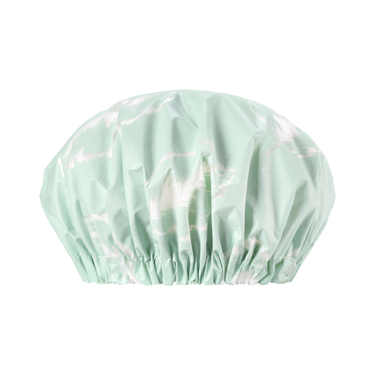 Introducing the Eco XL Shower Cap by EcoTools, a sustainable, light green bath accessory with a subtle white abstract pattern. This reusable cap features gathered elastic for a secure fit, emphasizing its vibrant color against a plain black background.