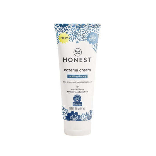 The Honest Companys Eczema Relief Cream, recognized by the National Eczema Association, features soothing therapy with skin protectant and colloidal oatmeal for eczema-prone skin. It provides daily moisture and comes in packaging with blue floral designs.