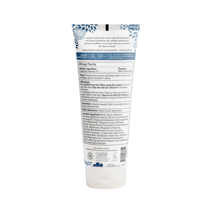 The image depicts the back of Eczema Relief Cream by The Honest Company, designed for eczema-prone skin. It shows ingredients, usage instructions, and drug facts on white packaging with blue accents and features dermatologist- and pediatrician-tested labels.
