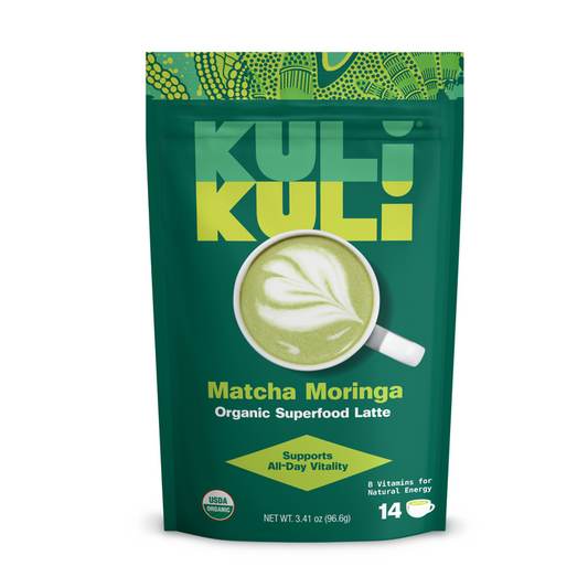 A green resealable pouch of Kuli Kuli Foods Energizing Organic Superfood Latte, featuring a cup of green latte, USDA Organic label, and highlighting 14 servings with moringa, matcha, and B vitamins for natural energy.
