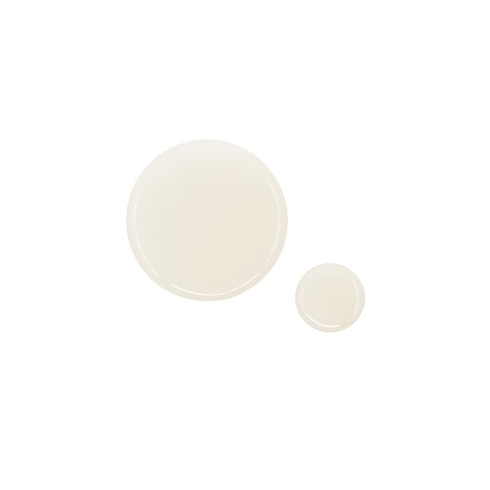 Two clear, translucent droplets rest on a white background. The larger droplet on the left represents OSEAs Essential Hydrating Oil, promising to reduce fine lines for a glowing complexion. Both droplets boast shiny, reflective surfaces.