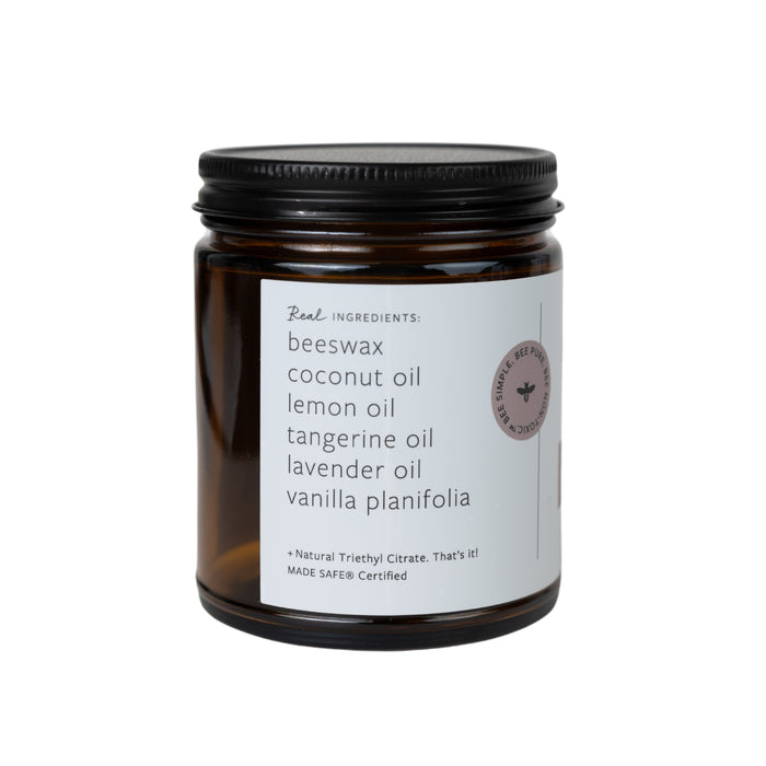 The Essential Oil Beeswax Melts - Lavender Vanilla Tangerine by Fontana Candle Co. comes in a brown jar with a black lid and lists real ingredients like beeswax, coconut, lemon, lavender oils, and vanilla planifolia. Its certified MADE SAFE for pure scents.