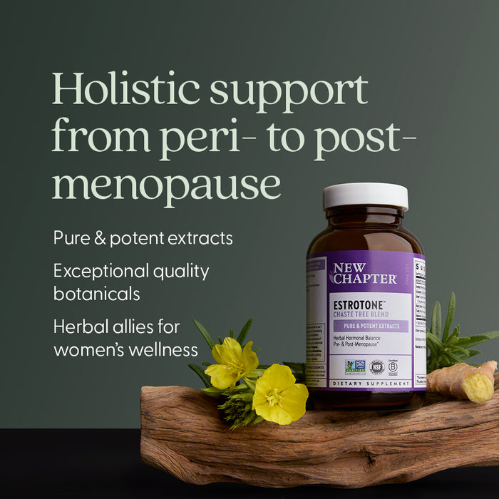 A bottle of New Chapter Estrotone™ Herbal Hormone Balance, Pre & Post Menopause sits on a wooden tray with yellow flowers and green leaves, promoting pure extracts for holistic menopause support and women’s hormone balance.